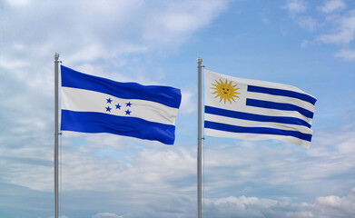 Uruguay and Honduras flags, country relationship concept