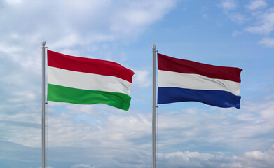 Netherlands and Hungary flags, country relationship concept