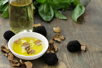 natural fresh organic aromatic oil with black truffle - obrazy, fototapety, plakaty
