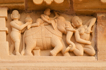 Beautiful carving of elephant and people on the wall of Laxman Temple, Khajuraho, Madhya Pradesh, India, Asia
