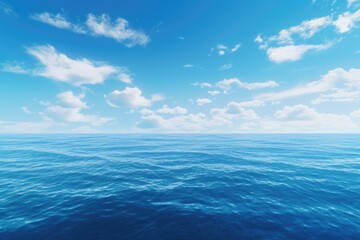 Obraz premium A picturesque scene featuring a large body of water with beautiful clouds in the sky. Perfect for adding a sense of tranquility and serenity to any project.