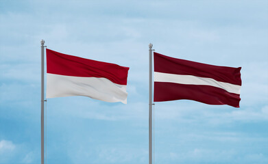 Latvia and Indonesia and Bali flags, country relationship concept