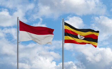 Uganda and Indonesia and Bali flags, country relationship concept