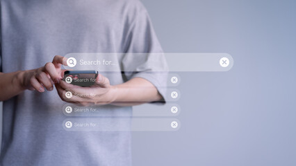 Man using a mobile phone searching browsing internet data information. Search engine optimization the internet with search bar. Best SEO technology networking.