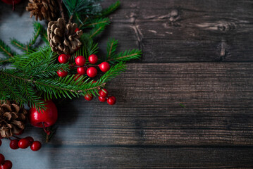 Christmas wreath on a wooden surface