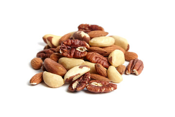 Mixed nuts isolated on white background. Almonds, Brazil nuts and peeled pecans mix. Wholesome nut assortment for energy.