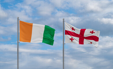 Georgia and Ivory Coast flags, country relationship concept