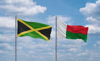 Madagascar and Jamaica flags, country relationship concept