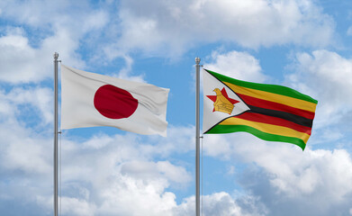 Zimbabwe and Japan flags, country relationship concept