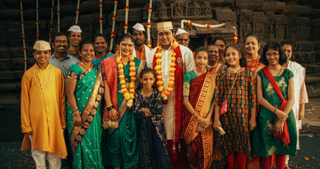 Portrait of an Extended Indian Family Taking a Photo on a Traditional Wedding. Authentic Footage of...