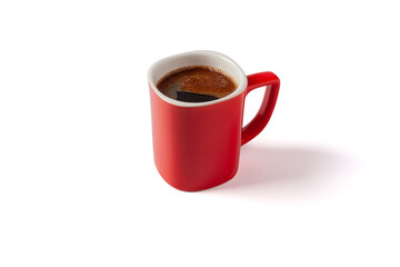 A red cup of strong coffee isolated on white. Red mug with coffee