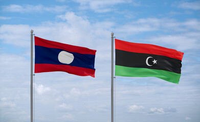 Libya and Laos flags, country relationship concept