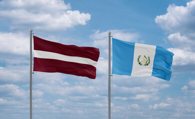 Guatemala and Latvia flags, country relationship concept