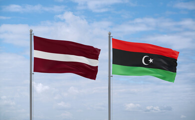 Libya and Latvia flags, country relationship concept