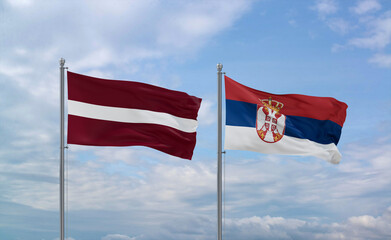 Serbia and Latvia flags, country relationship concept
