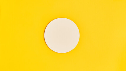 blank mockup for advertisement or invitation on a bright yellow background