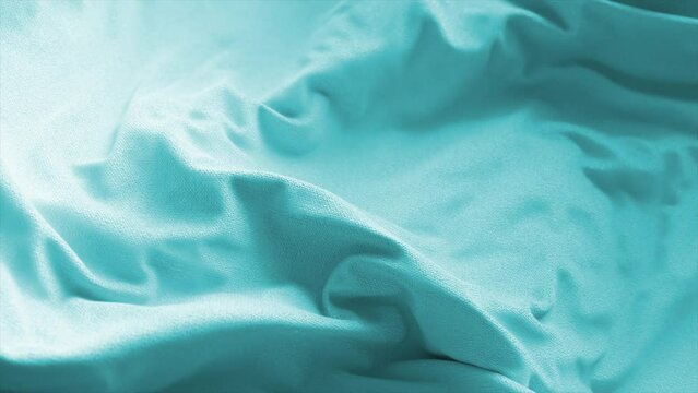 Close-up of a gentle aqua or turquoise fabric, possibly soft cotton or microfiber, with delicate folds and creases. 3d animation