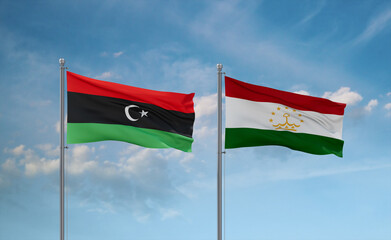 Tajikistan and Libya flags, country relationship concept
