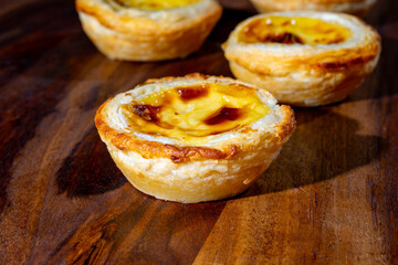 Portugal's traditional sweet dessert Pastel de nata egg custard tart pastry in cup