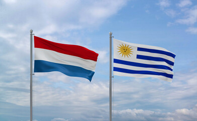Uruguay and Luxembourg flags, country relationship concept