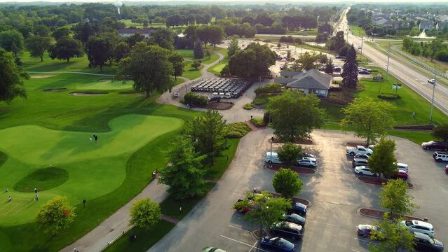 Aerial view of the car park of golf club members. Parked cars in a parking lot in a golf club.