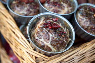 French food, artisan oven baked meat terrine, pate from pork on weekly marken in Belgian Durbuy small town