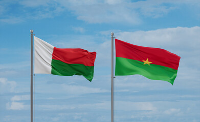 Burkina Faso and Madagascar flags, country relationship concept