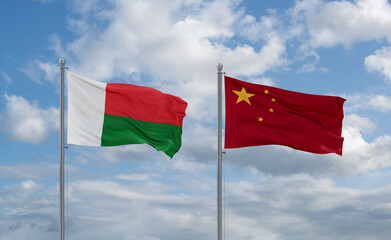 China and Madagascar flags, country relationship concept