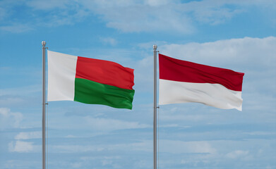Indonesia and Madagascar flags, country relationship concept