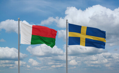 Sweden and Madagascar flags, country relationship concept