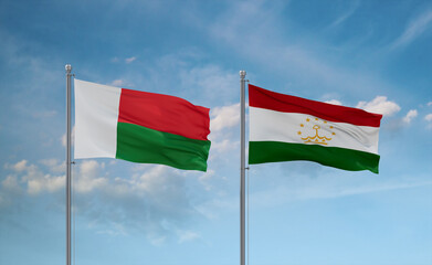 Tajikistan and Madagascar flags, country relationship concept