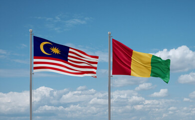 Guinea and Malaysia flags, country relationship concept