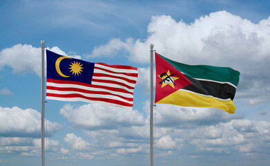 Mozambique and Malaysia flags, country relationship concept