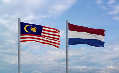 Netherlands and Malaysia flags, country relationship concept
