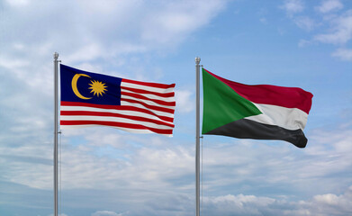 Sudan and Malaysia flags, country relationship concept