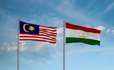 Tajikistan and Malaysia flags, country relationship concept