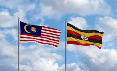 Uganda and Malaysia flags, country relationship concept