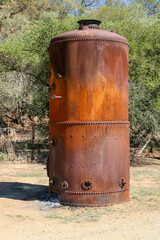 Obraz premium rusty vintage tank parked in a yard not used for years, design element for dystopia works