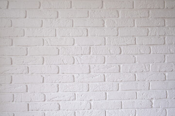 The wall is made of white brick. Background, a place for your text. High quality photo
