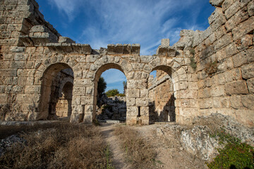 Scenic ruins of the nymphaeum (nymphaion) in Perge (Perga) at Antalya Province, Turkey. Awesome view of the ancient Greek city. Perge is a popular tourist destination in Turkey.