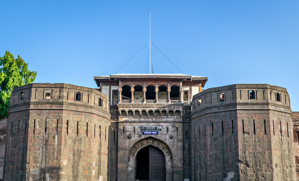 Historical , ancient, stone made monument named Shaniwar Wada in Pune. Text in local language is name" Shaniwar Wada".