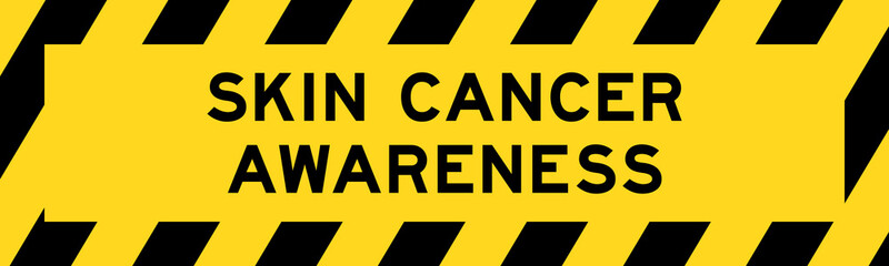 Obraz premium Yellow and black color with line striped label banner with word skin cancer awareness