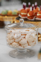 Marshmallows. Candy bar. Table with sweets, candies, and dessert. Close up. Wedding event