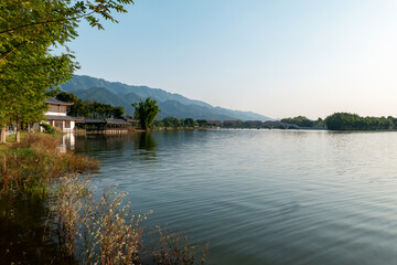 Fototapeta premium The attic on the lake，Beautiful Longshui Lake Wetland Park, Chongqing, China