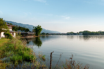 Fototapeta premium The attic on the lake，Beautiful Longshui Lake Wetland Park, Chongqing, China