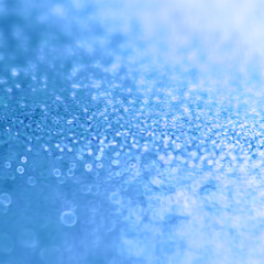 blue glitter sparkling festive background, selective focus