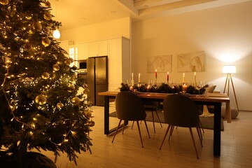 Cozy spacious kitchen decorated for Christmas. Interior design