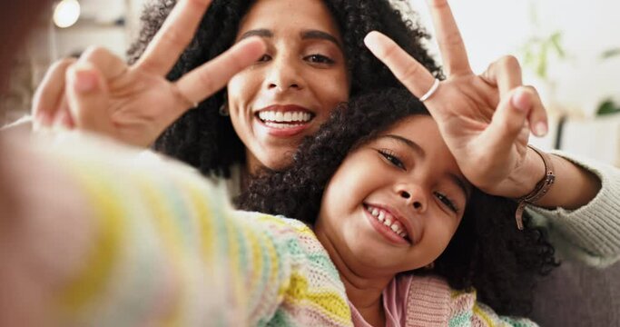 Selfie, mother and daughter in home with peace sign for social media photography, funny face and kiss. Woman, girl child and smile together for comic profile picture with app, happiness and love