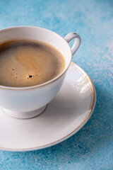 cup of coffee on blue background