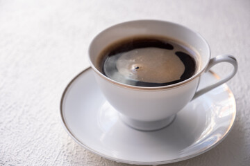 cup of coffee on a white background